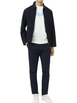 Pantalon chino en coton marine à coupe slim pourvu de poches plaquées