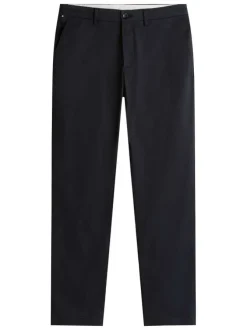 Pantalon chino en coton marine à motifs avec une coupe droite et logos brodés
