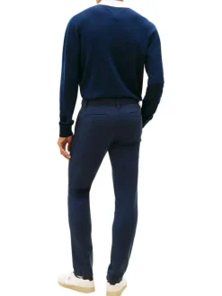 Pantalon Chino en coton marine uni avec une coupe slim à zip et à bouton