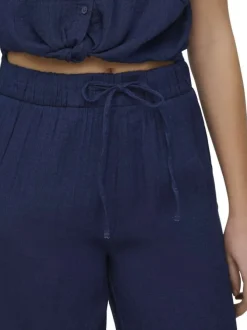 Pantalon chino en coton marine uni pourvu d'une taille élastiquée