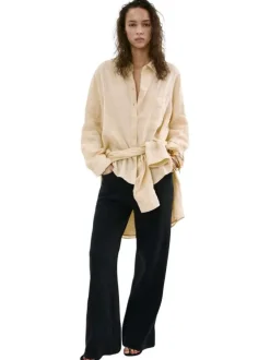 Pantalon chino en coton noir uni avec une coupe bootcut et des poches raglan