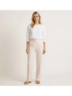 Pantalon chino en lin beige uni pourvu d'une taille intermédiaire