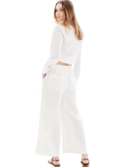 Pantalon chino en lin blanc uni avec une coupe flare et une taille élastiquée