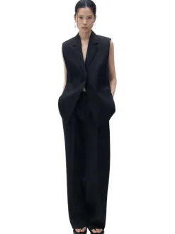 Pantalon chino en lin noir uni avec une coupe droite et des passants