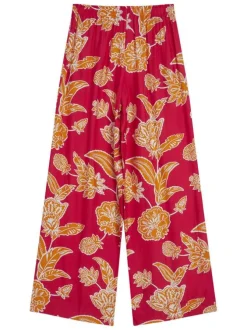 Pantalon chino fuchsia à motifs pourvu d'une taille élastiquée