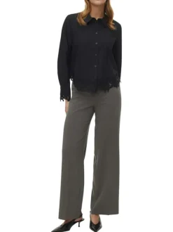 Pantalon chino gris pourvu d'une coupe ample et d'une fermeture zippée