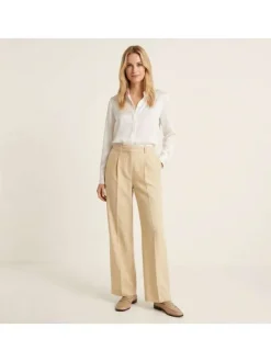 Pantalon chino jaune uni pourvu d'une coupe bootcut et d'une taille haute