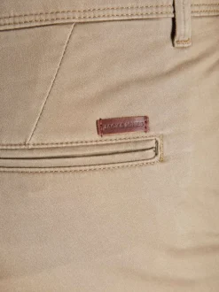 Pantalon chino Marco beige uni en coton avec une coupe slim et des poches