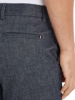 Pantalon Chino marine chiné avec une coupe slim et un style 4 poches
