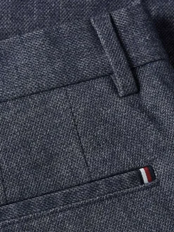 Pantalon Chino marine chiné avec une coupe slim et un style 4 poches