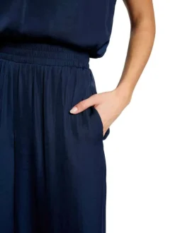 Pantalon chino marine uni avec une coupe large et de multiples poches