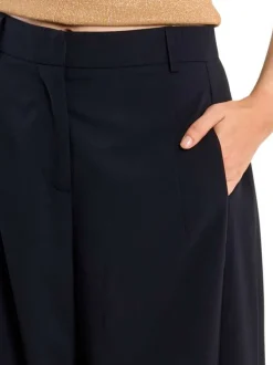 Pantalon chino marine uni pourvu d'une coupe large et d'une taille haute