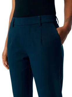 Pantalon chino marine uni pourvu d'une coupe slim et d'une taille intermédiaire