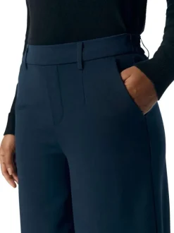 Pantalon chino marine uni pourvu d'une taille élastiquée et d'une coupe bootcut