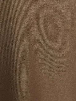 Pantalon chino marron uni pourvu d’une coupe bootcut et de multiples poches