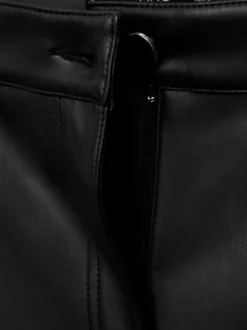 Pantalon chino noir enduit avec une coupe bootcut et 5 poches