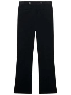 Pantalon Chino noir en maille côtelée pourvu d'une coupe bootcut