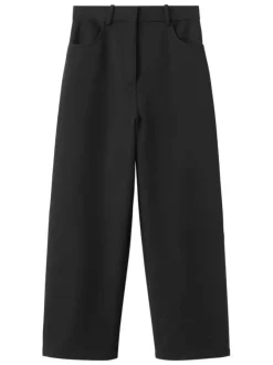Pantalon chino noir uni avec une coupe bootcut à zip avec une agrafe