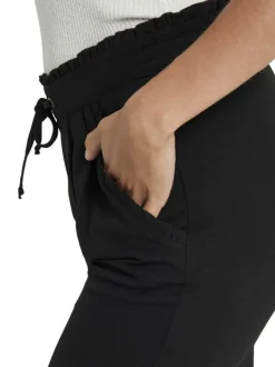 Pantalon Chino noir uni avec une coupe cigarette et une taille élastiquée