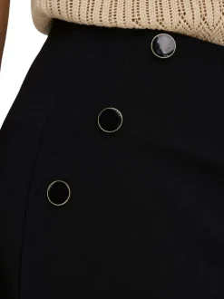 Pantalon chino noir uni à coupe bootcut avec des bijoux aux poches