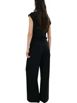 Pantalon chino noir uni pourvu d'une coupe bootcut et d'une taille haute