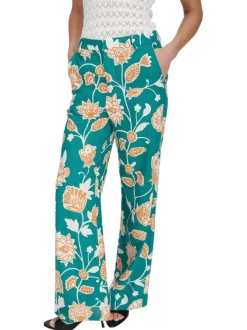 Pantalon chino vert avec des motifs floraux et une coupe flare