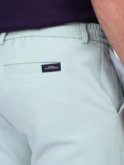 Pantalon chino vert d'eau uni avec une coupe ajustée à zip et à bouton