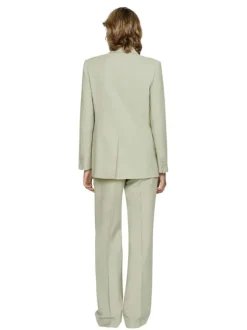 Pantalon Chino vert uni avec une coupe bootcut et zippé boutonné à la taille