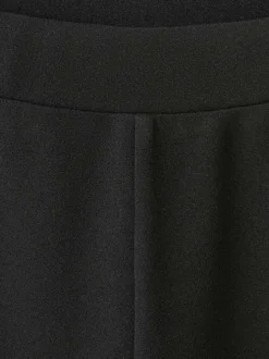 Pantalon costume noir uni avec une coupe droite et une taille élastiquée
