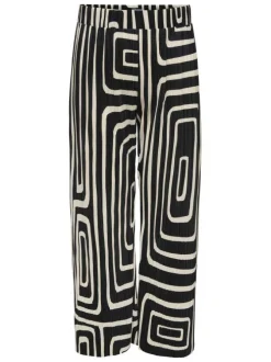 Pantalon écru et noir plissé pourvu d'un motif géométrique et d'une coupe ample