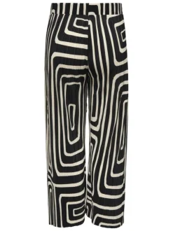 Pantalon écru et noir plissé pourvu d'un motif géométrique et d'une coupe ample
