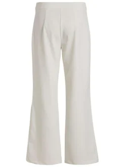 Pantalon écru uni avec une coupe bootcut et 2 poches à l'avant