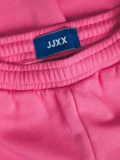 Pantalon de jogging Abbie rose en coton mélangé avec logo floqué ton sur ton