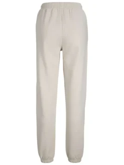 Pantalon de jogging en coton écru uni à coupe large et élastiqué aux chevilles