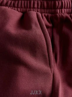 Pantalon de jogging en coton mélangé bordeaux uni à coupe slim fit