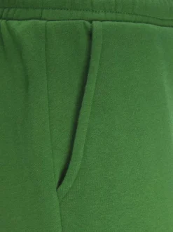 Pantalon de jogging en coton vert uni à coupe large et élastiqué aux chevilles