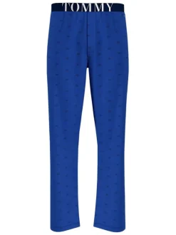 Pantalon de pyjama en coton biologique bleu avec une coupe droite et logo all-over