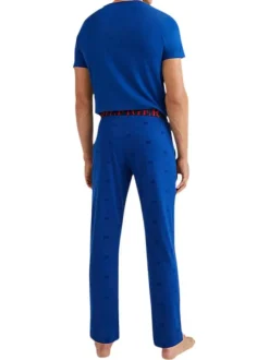 Pantalon de pyjama en coton biologique bleu avec une coupe droite et logo all-over