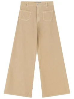 Pantalon en coton beige en velours côtelé avec une coupe bootcut