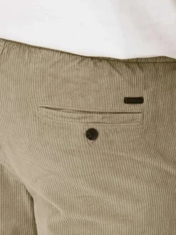 Pantalon en coton beige en velours côtelé à coupe regular fit