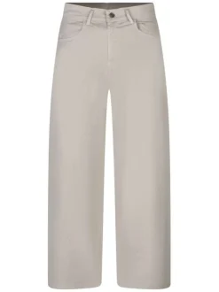 Pantalon en coton beige uni pourvu d'une coupe large et d'une taille haute