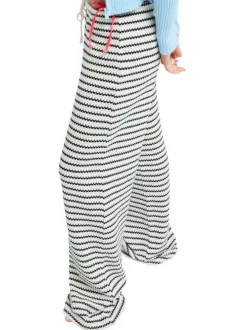 Pantalon en coton blanc et noir à coupe ample pourvu d'un cordon de serrage