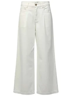 Pantalon en coton blanc uni pourvu d'une coupe baggy et d'une taille haute
