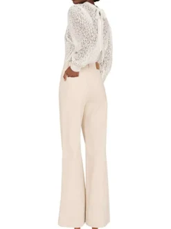 Pantalon en coton écru en velours côtelé avec une coupe bootcut
