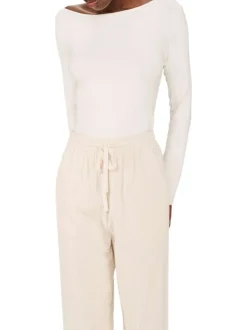 Pantalon en coton écru en velours côtelé avec une coupe droite