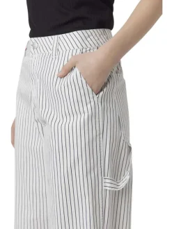 Pantalon en coton écru rayé avec une coupe bootcut et une taille intermédiaire
