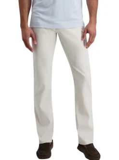 Pantalon en coton écru uni avec une coupe ajustée et des poches à l'italienne