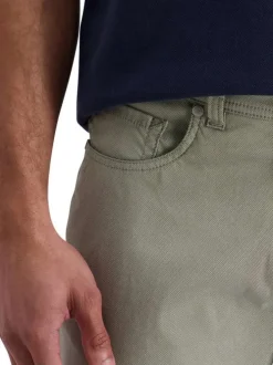 Pantalon en coton kaki uni avec une coupe ajustée et des poches à l'italienne
