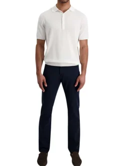 Pantalon en coton marine uni avec une coupe ajustée et des poches à l'italienne