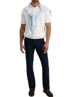 Pantalon en coton marine uni avec une coupe ajustée et des poches à l'italienne